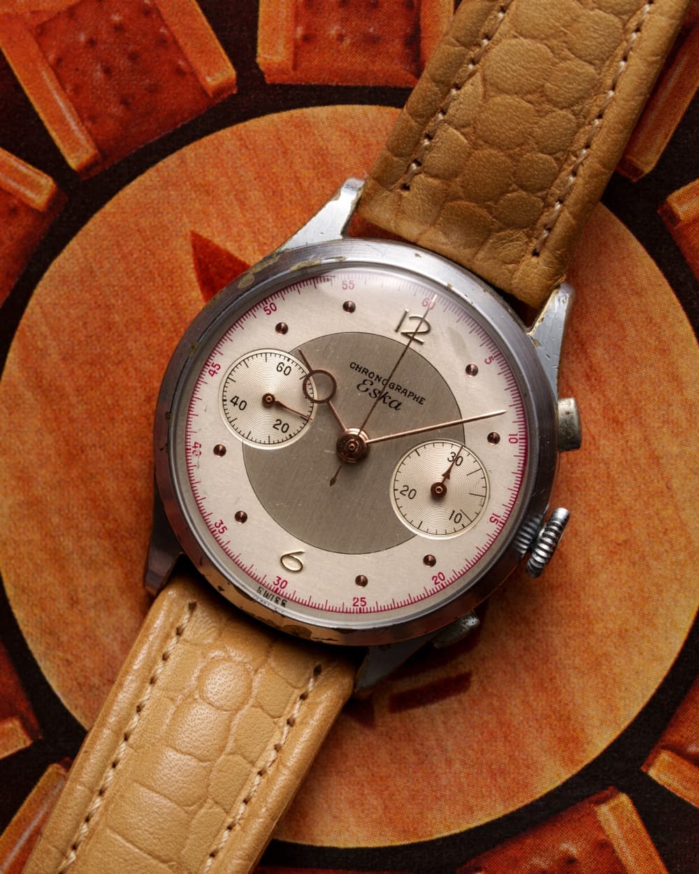 Vintage chronograph with two-tone cream dial on a tan crocodile strap